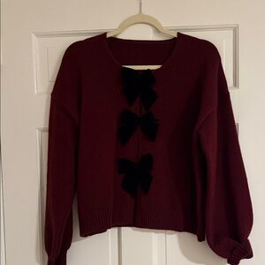 Elegant Burgundy Sweater with Black Bow Accents